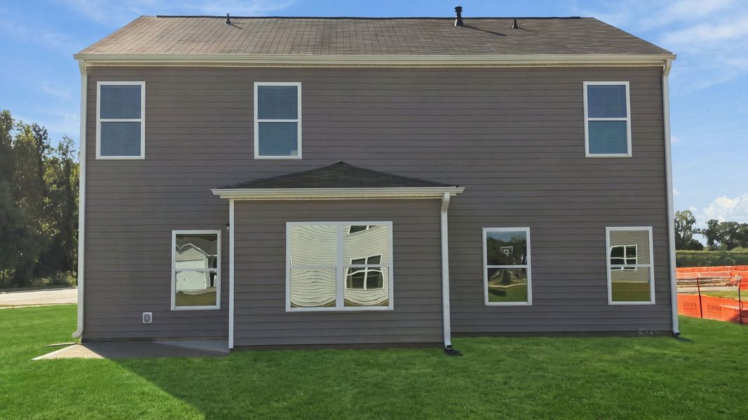 Exterior details and patio area of a home in Bynum Farms, Farmville (Image 24).