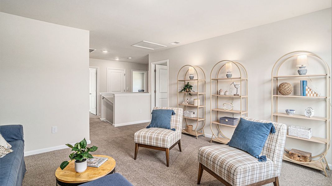 Furnished interior in a model home at South Island landing in Georgetown (Image 32).