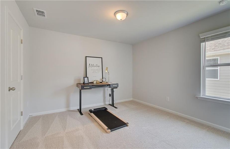 Furnished interior view inside a new home in Enclave at Evergreen, Fairburn (Image 16).