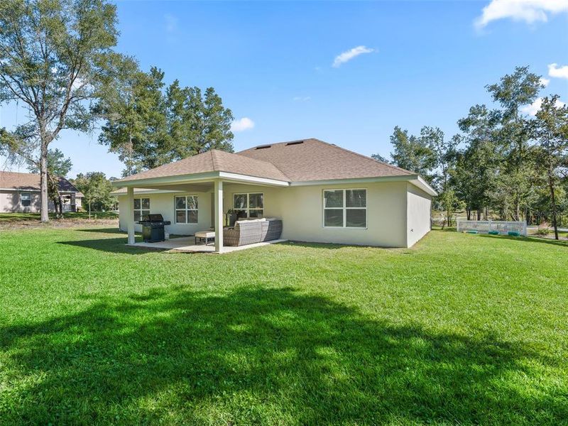 Exterior details and patio area of a home in Dorchester, Ocala (Image 26).