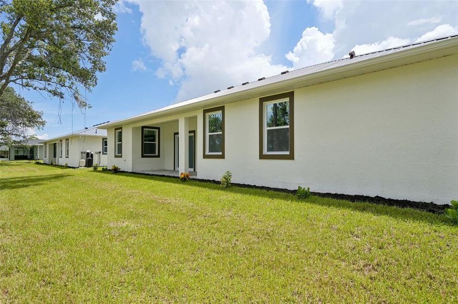 Front exterior of a new home in , North Port, FL, highlighting curb appeal (Image 21).