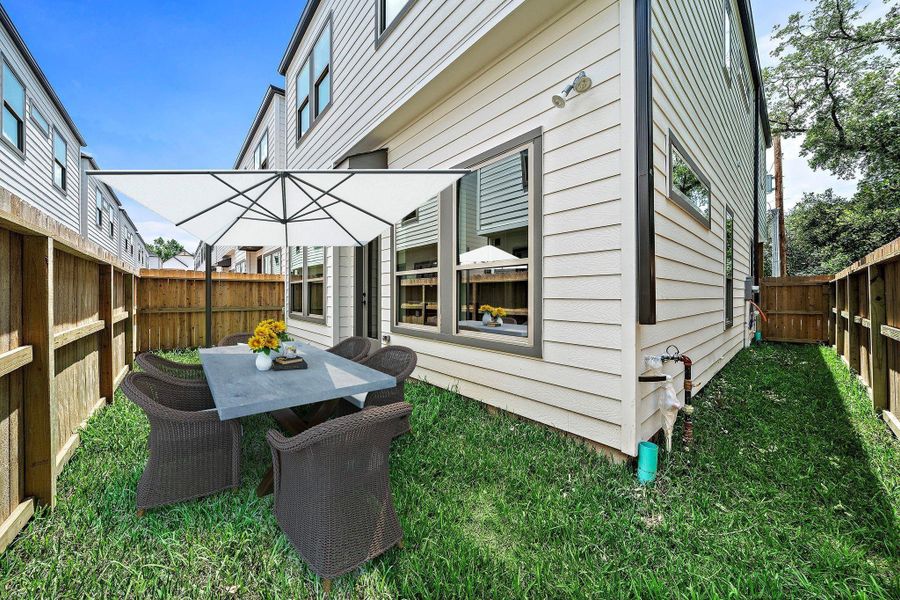 Exterior details and patio area of a home in , Houston (Image 3).