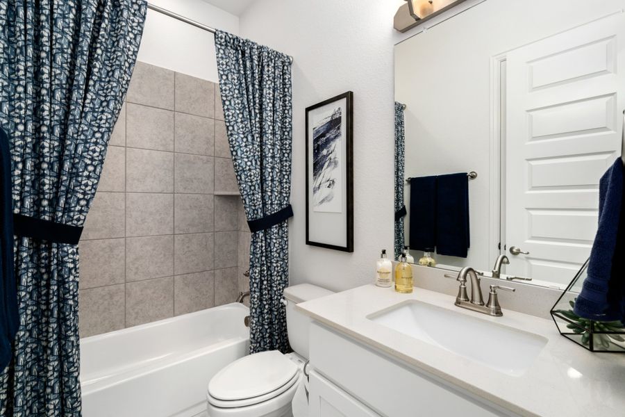 Representative furnished interior of a home built from the Mason by UnionMain Homes in Edgewater, Fate (Image 9).