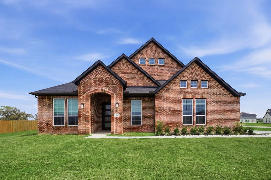 Front exterior of a new home in Suncreek Estates, Rosharon, TX, highlighting curb appeal (Image 1). Front exterior of a new home in Suncreek Estates, Rosharon, TX, highlighting curb appeal (Image 1).