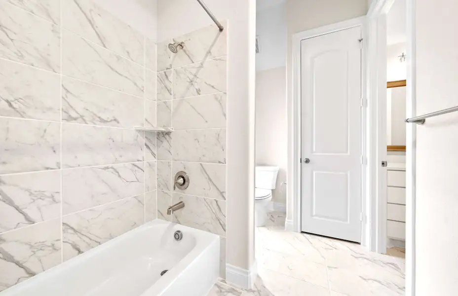 Representative furnished interior of a home built from the 3068 by Ravenna Homes in The Woodlands Hills 65′, Willis (Image 19).