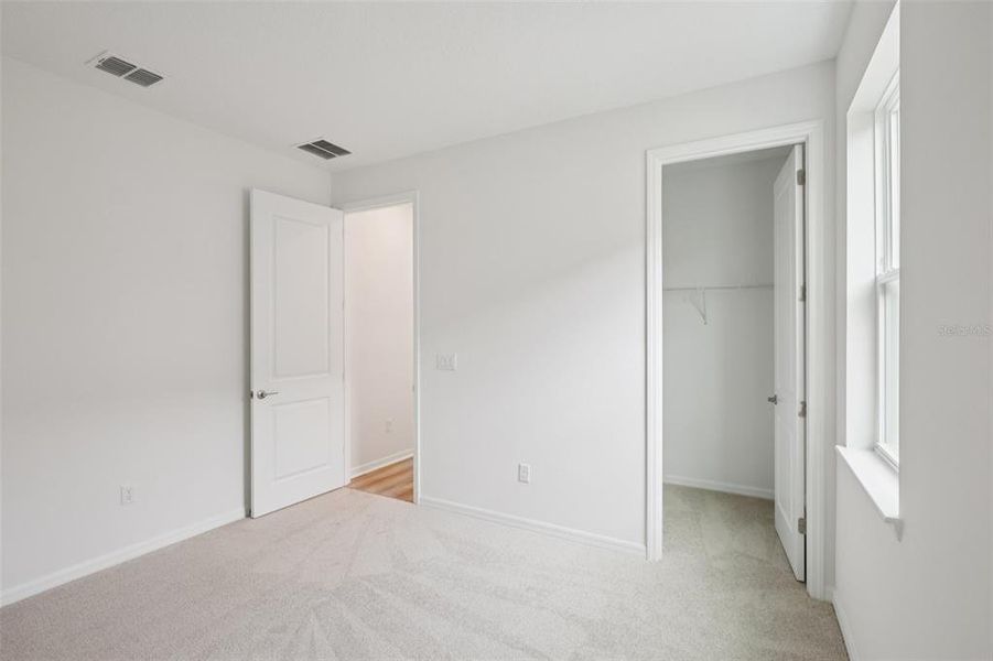 Spacious, unfurnished interior of a new home in Primrose at Longleaf, New Port Richey (Image 43).