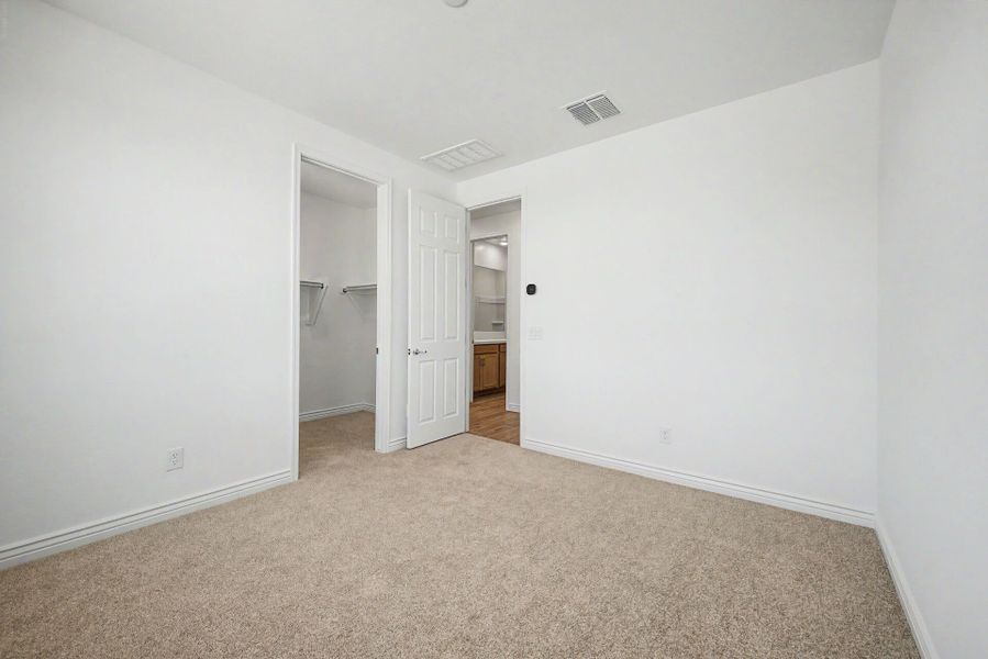 Spacious, unfurnished interior of a new home in Miravida, Surprise (Image 11).