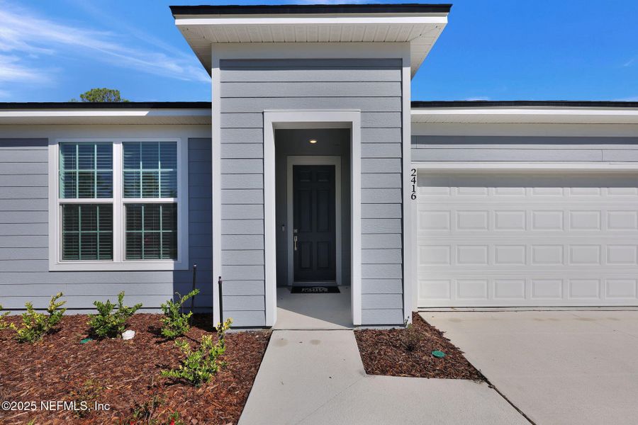 Exterior details and patio area of a home in Bradley Creek, Green Cove Springs (Image 28).
