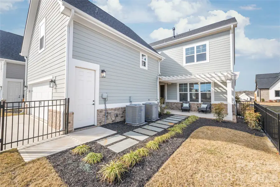Exterior details and patio area of a home in , Davidson (Image 4).