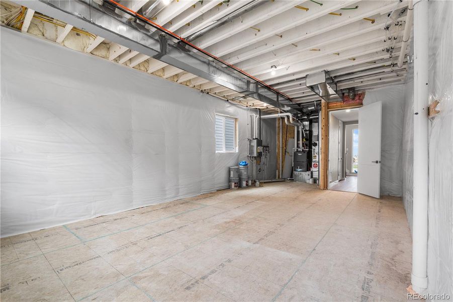 In-progress construction of a new home in Tribute at Lyric, Lone Tree, CO (Image 35).