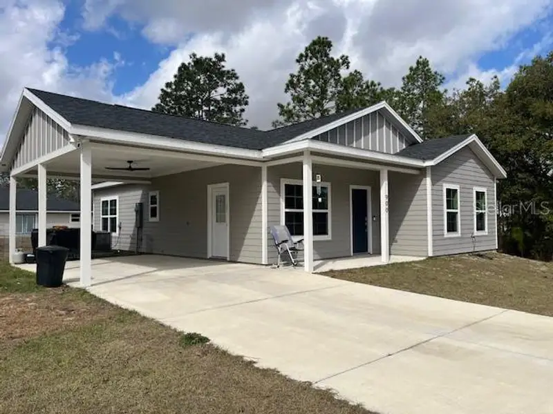 Front exterior of a new home in , Williston, FL, highlighting curb appeal (Image 1). Front exterior of a new home in , Williston, FL, highlighting curb appeal (Image 1).