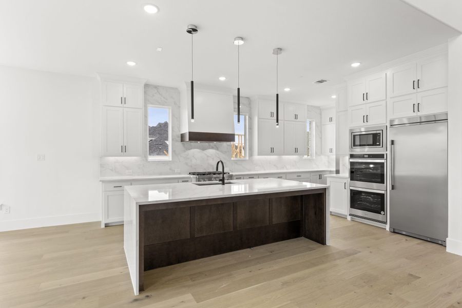 Representative furnished interior of a home built from the 6051 by Tradition Homes in Mustang Lakes, McKinney (Image 5).