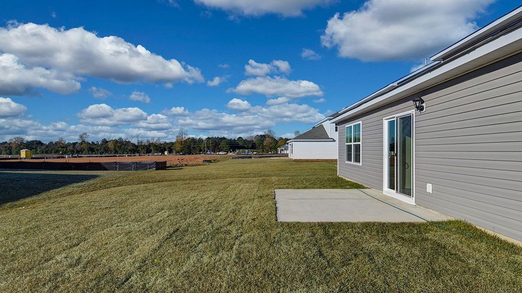 Exterior details and patio area of a home in Hunter's Branch, Hopkins (Image 4).