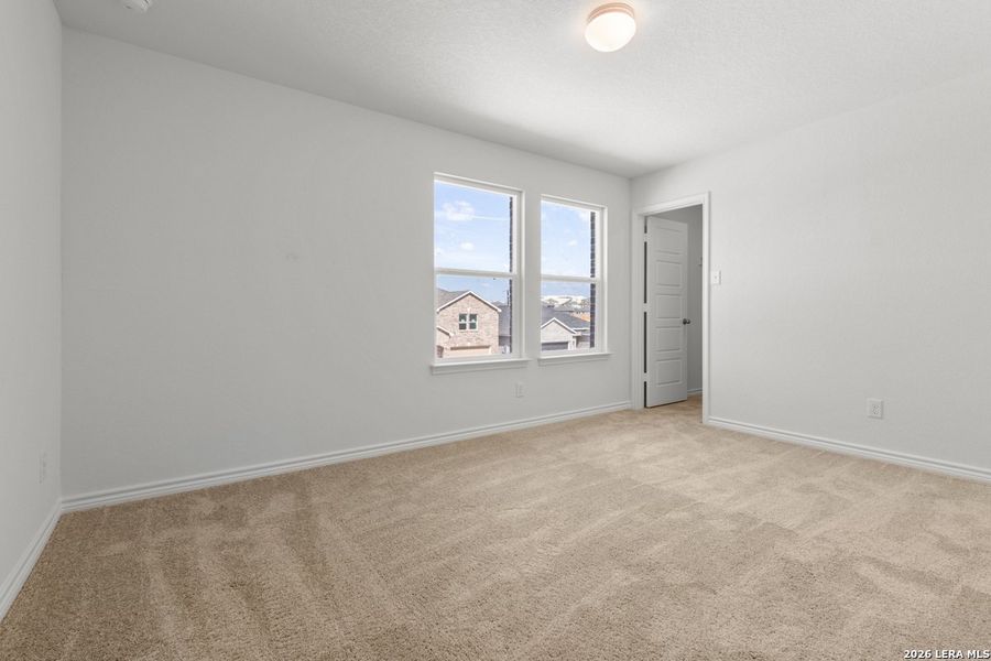 Spacious, unfurnished interior of a new home in Hidden Bluffs at TRP, San Antonio (Image 23).