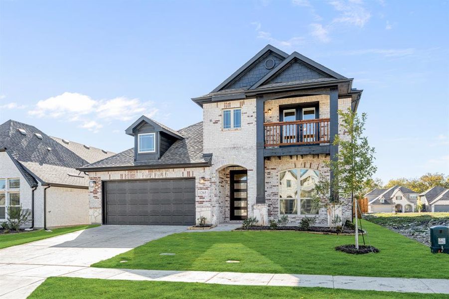 Front exterior of a new home in Anderson Crossing, Trenton, TX, highlighting curb appeal (Image 2). Front exterior of a new home in Anderson Crossing, Trenton, TX, highlighting curb appeal (Image 2).
