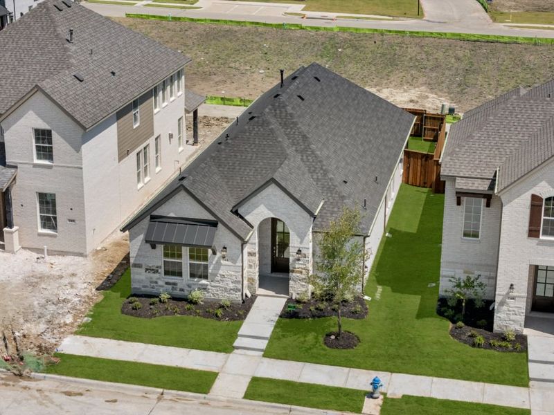 Image 45 representing the Cypress by UnionMain Homes in Edgewater, Fate, TX.