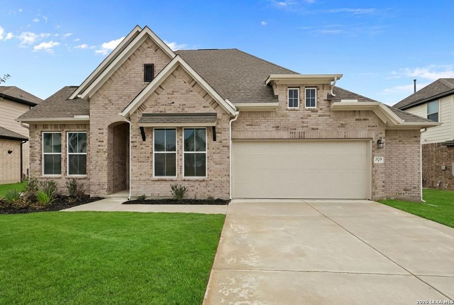 Front exterior of a new home in Buffalo Crossing, Cibolo, TX, highlighting curb appeal (Image 19).