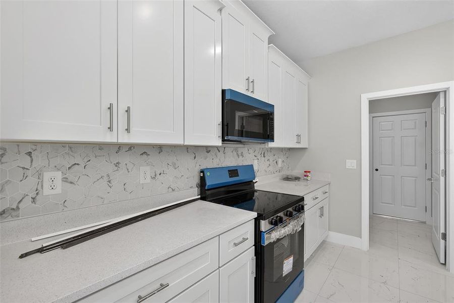 Furnished interior view inside a new home in , Port Charlotte (Image 10).