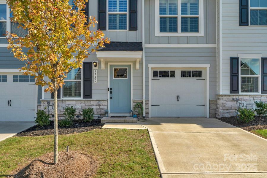 Front exterior of a new home in , Troutman, NC, highlighting curb appeal (Image 28).