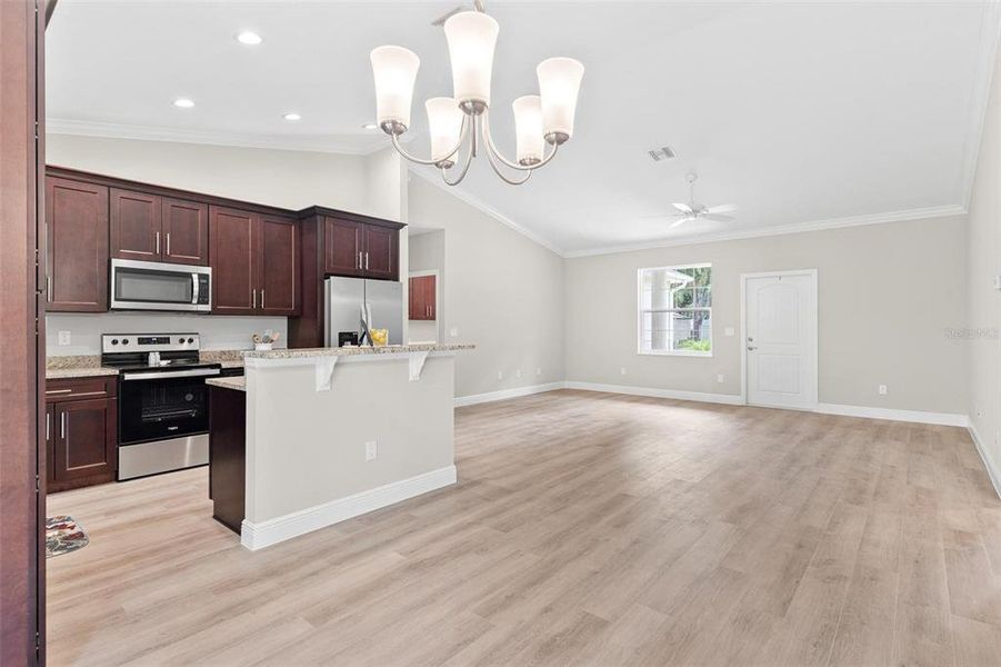 Dining Area overlooking Kitchen and Living Area