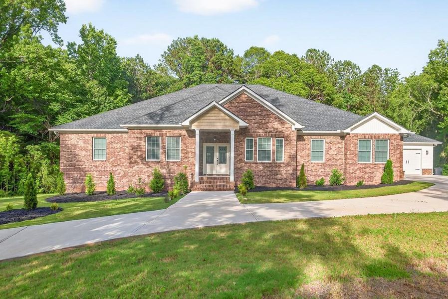 Front exterior of a new home in , Oxford, GA, highlighting curb appeal (Image 28). Front exterior of a new home in , Oxford, GA, highlighting curb appeal (Image 28).