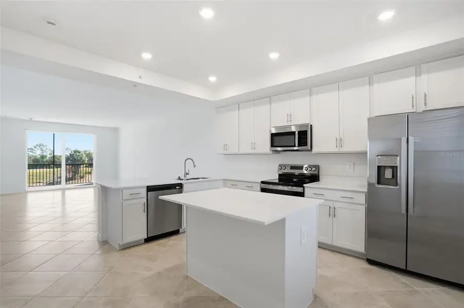 Furnished interior view inside a new home in Wellen Park Golf & Country Club, Venice (Image 11).