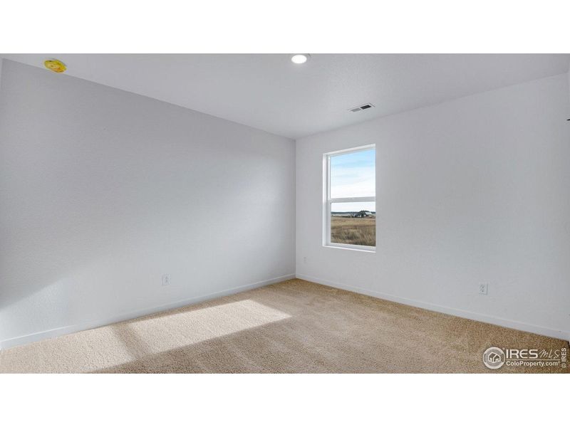 Spacious, unfurnished interior of a new home in Vista Meadows, Fort Lupton (Image 30).