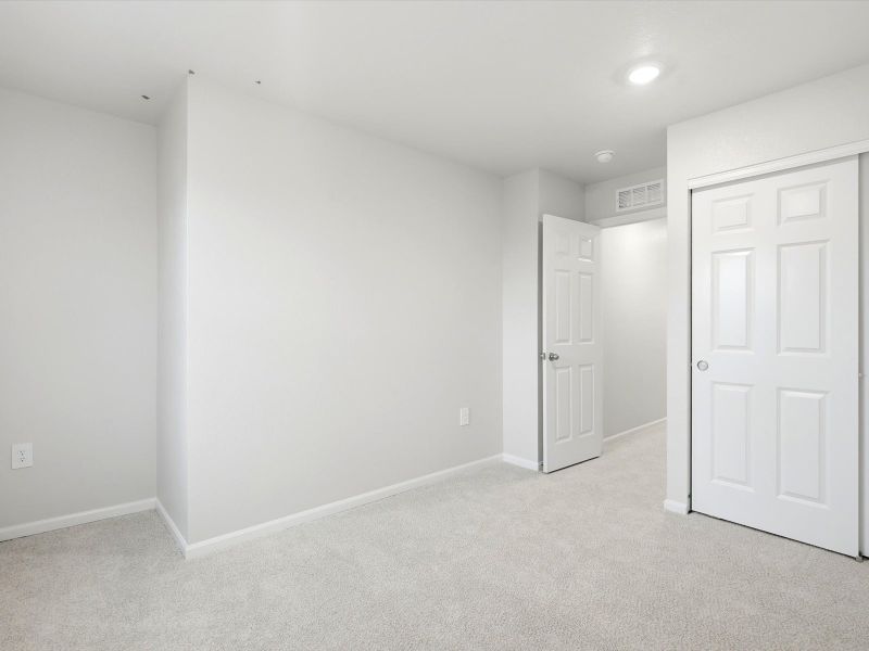 Spacious, unfurnished interior of a new home in Frontier Estates - The Trails Collection, Firestone (Image 14).