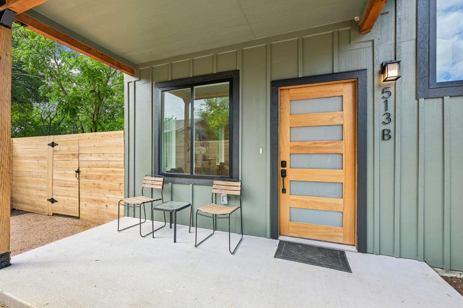 A covered front patio welcomes you home, perfect for relaxed outdoor living. A covered front patio welcomes you home, perfect for relaxed outdoor living.