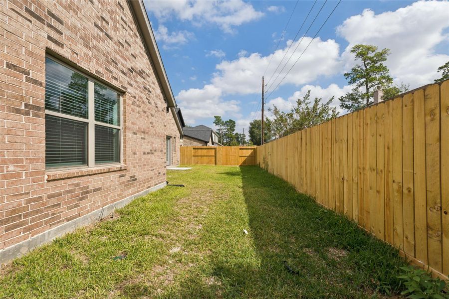 Exterior details and patio area of a home in , Spring (Image 17).