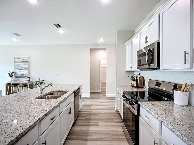 Furnished interior view inside a new home in , North Port (Image 41).