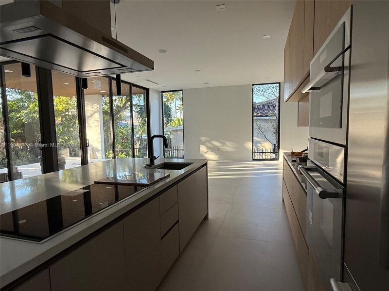 Furnished interior view inside a new home in , Surfside (Image 13).