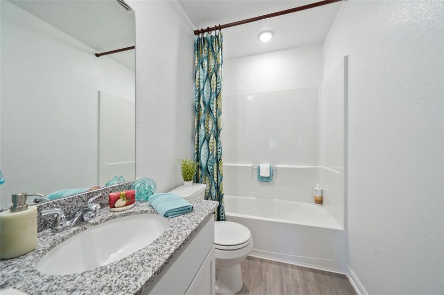 Furnished interior view inside a new home in Granger Pines, Conroe (Image 24).