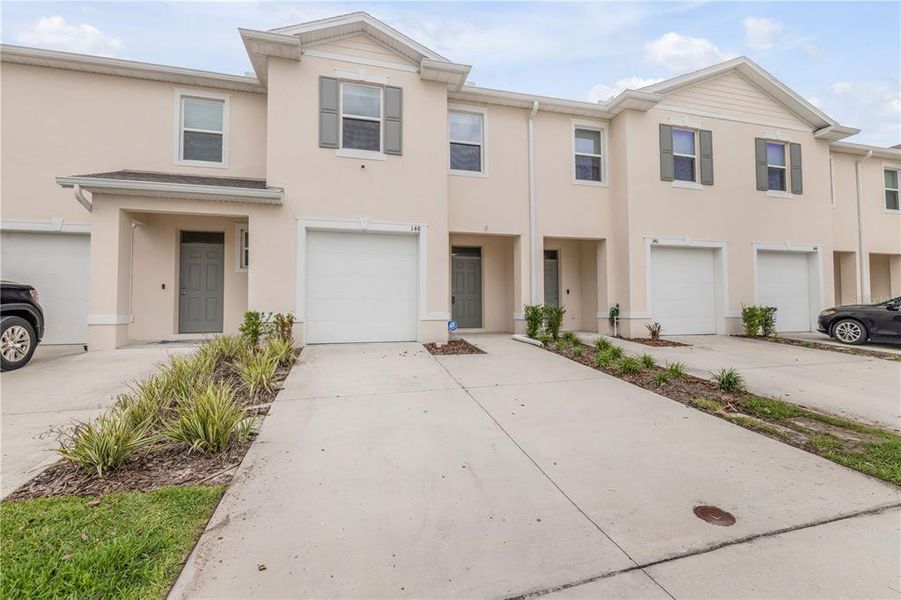 Front exterior of a new home in , Daytona Beach, FL, highlighting curb appeal (Image 22). Front exterior of a new home in , Daytona Beach, FL, highlighting curb appeal (Image 22).