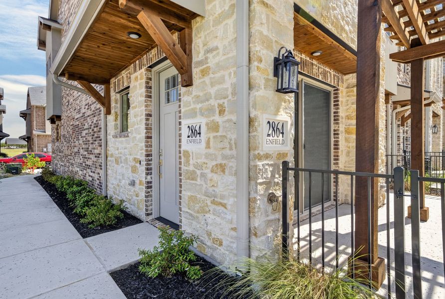 Exterior details and patio area of a home in The Tribute, The Colony (Image 3).