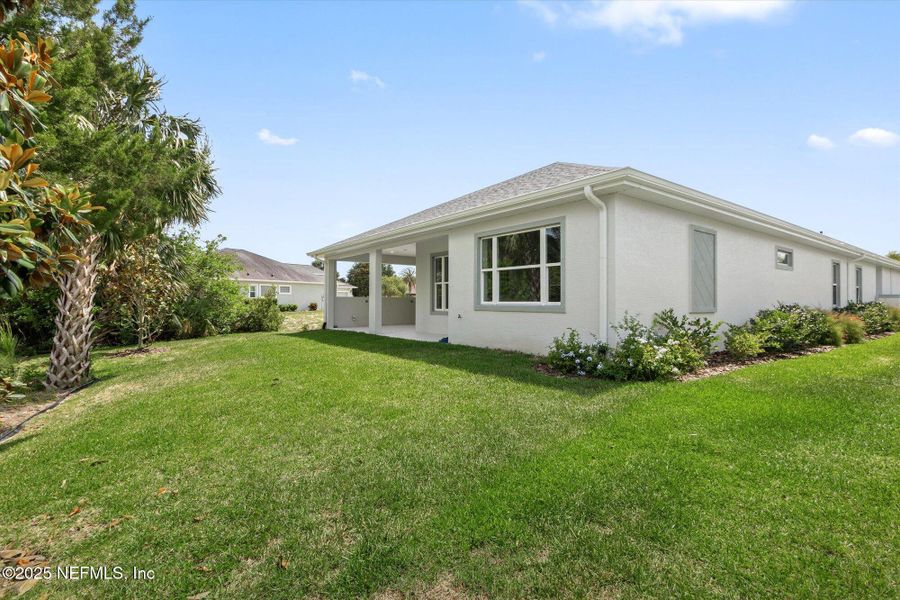 Front exterior of a new home in , Palm Coast, FL, highlighting curb appeal (Image 28). Front exterior of a new home in , Palm Coast, FL, highlighting curb appeal (Image 28).