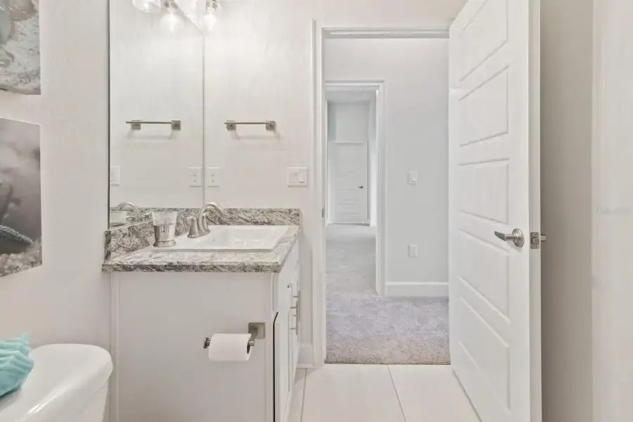 Representative furnished interior of a home built from the 1820 by Adams Homes in Flagler Estates, Hastings (Image 49).