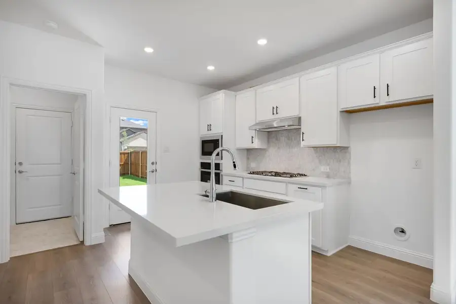 Furnished interior view inside a new home in Cross Creek Meadows, Celina (Image 3).