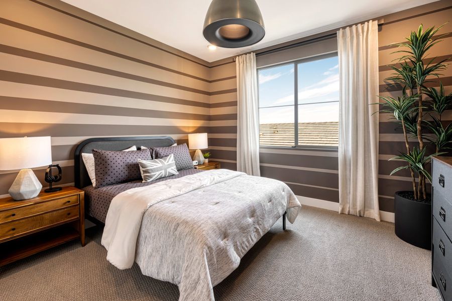 Representative furnished interior of a home built from the Willow Plan 40-9 by Tri Pointe Homes in Waterston Central, Gilbert (Image 15).