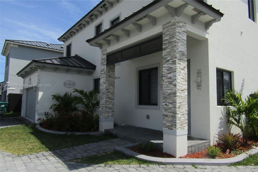 Front exterior of a new home in , Miami, FL, highlighting curb appeal (Image 17). Front exterior of a new home in , Miami, FL, highlighting curb appeal (Image 17).