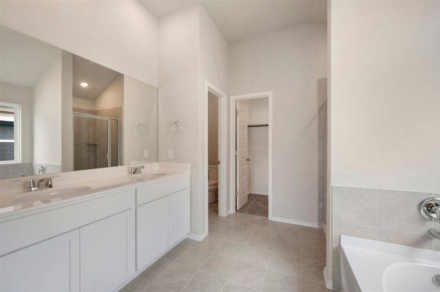 Furnished interior view inside a new home in Heritage, Dripping Springs (Image 5).