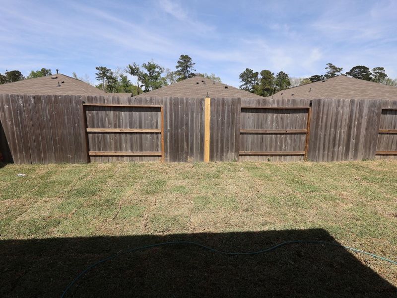 Exterior details and patio area of a home in Pinewood at Grand Texas, New Caney (Image 3).