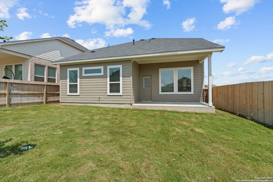 Front exterior of a new home in Hunters Ranch, San Antonio, TX, highlighting curb appeal (Image 28). Front exterior of a new home in Hunters Ranch, San Antonio, TX, highlighting curb appeal (Image 28).