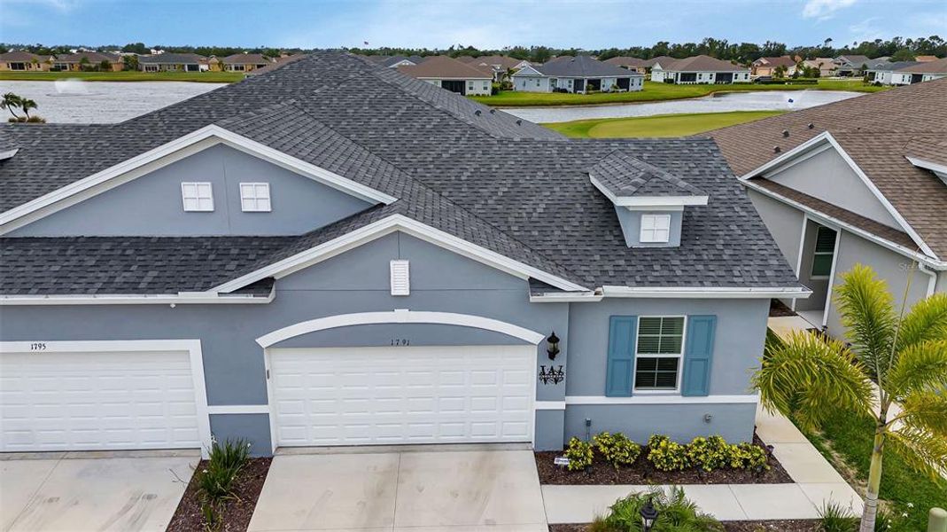 Front exterior of a new home in , Punta Gorda, FL, highlighting curb appeal (Image 2).
