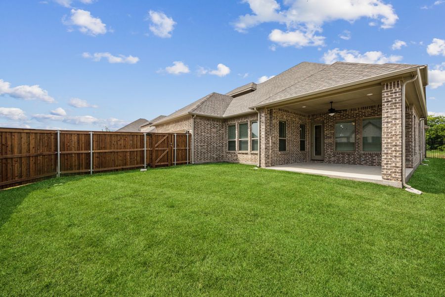 Representative exterior photo of a completed home built from the Normandy by Chesmar Homes in Karis, Crowley, TX (Image 8). Representative exterior photo of a completed home built from the Normandy by Chesmar Homes in Karis, Crowley, TX (Image 8).