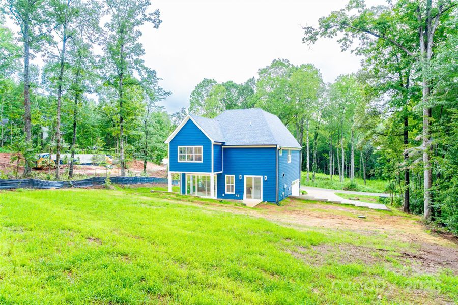 Front exterior of a new home in , Statesville, NC, highlighting curb appeal (Image 23).