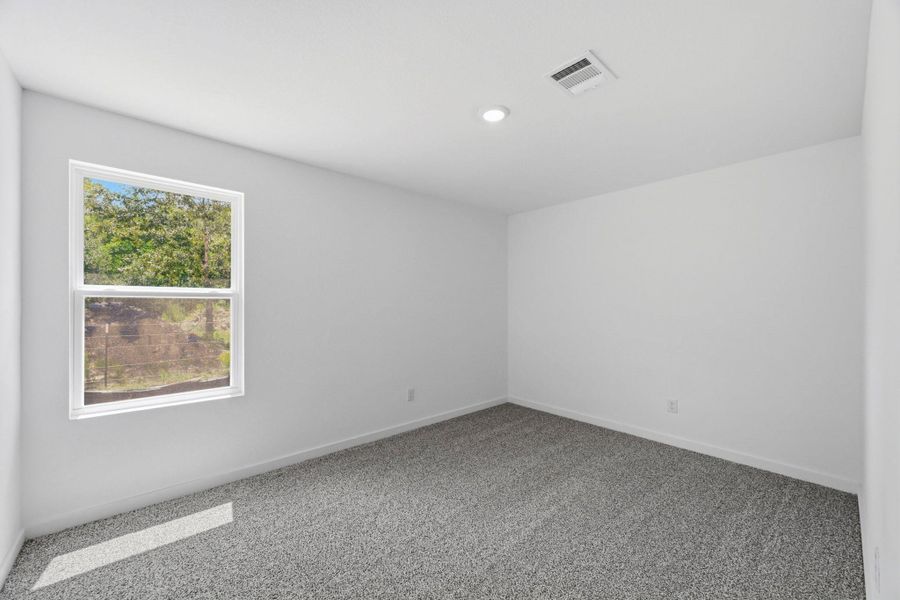 Spacious, unfurnished interior of a new home in Baron Village, Conroe (Image 14). Spacious, unfurnished interior of a new home in Baron Village, Conroe (Image 14).
