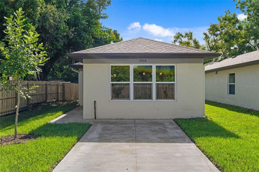 Front exterior of a new home in , Sarasota, FL, highlighting curb appeal (Image 20).