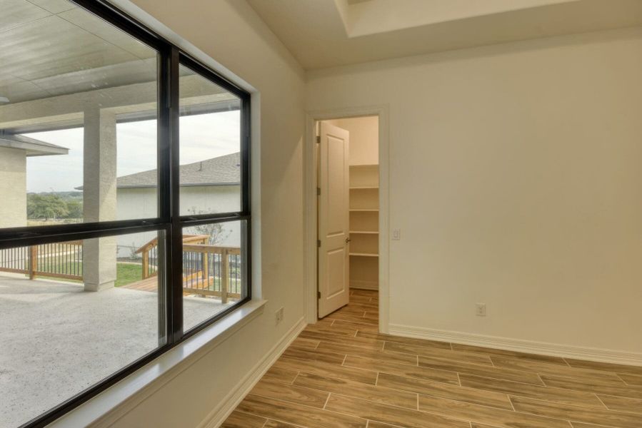 Spacious, unfurnished interior of a new home in El Sonido at Campanas, San Antonio (Image 34).