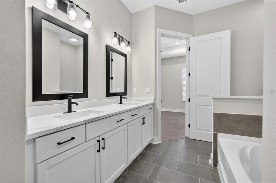 Furnished interior view inside a new home in Stables at Cary Forest, Bryceville (Image 10).